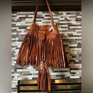 FRYE -    Heidi brown leather fringe bucket bag!